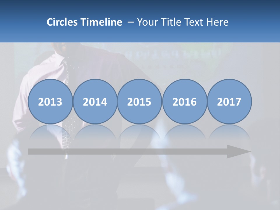 A Man In A Pink Shirt And Tie Standing In Front Of A Projector Screen PowerPoint Template