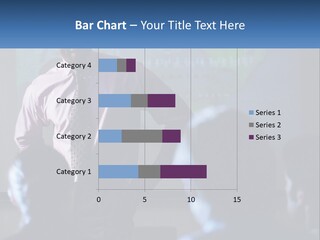 A Man In A Pink Shirt And Tie Standing In Front Of A Projector Screen PowerPoint Template