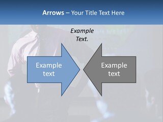 A Man In A Pink Shirt And Tie Standing In Front Of A Projector Screen PowerPoint Template