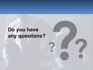 A Man In A Pink Shirt And Tie Standing In Front Of A Projector Screen PowerPoint Template