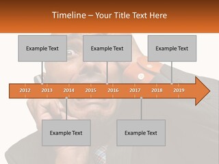 A Man Holding A Cell Phone To His Ear PowerPoint Template