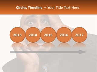 A Man Holding A Cell Phone To His Ear PowerPoint Template