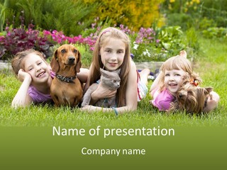 A Group Of Children Laying In The Grass With A Dog PowerPoint Template