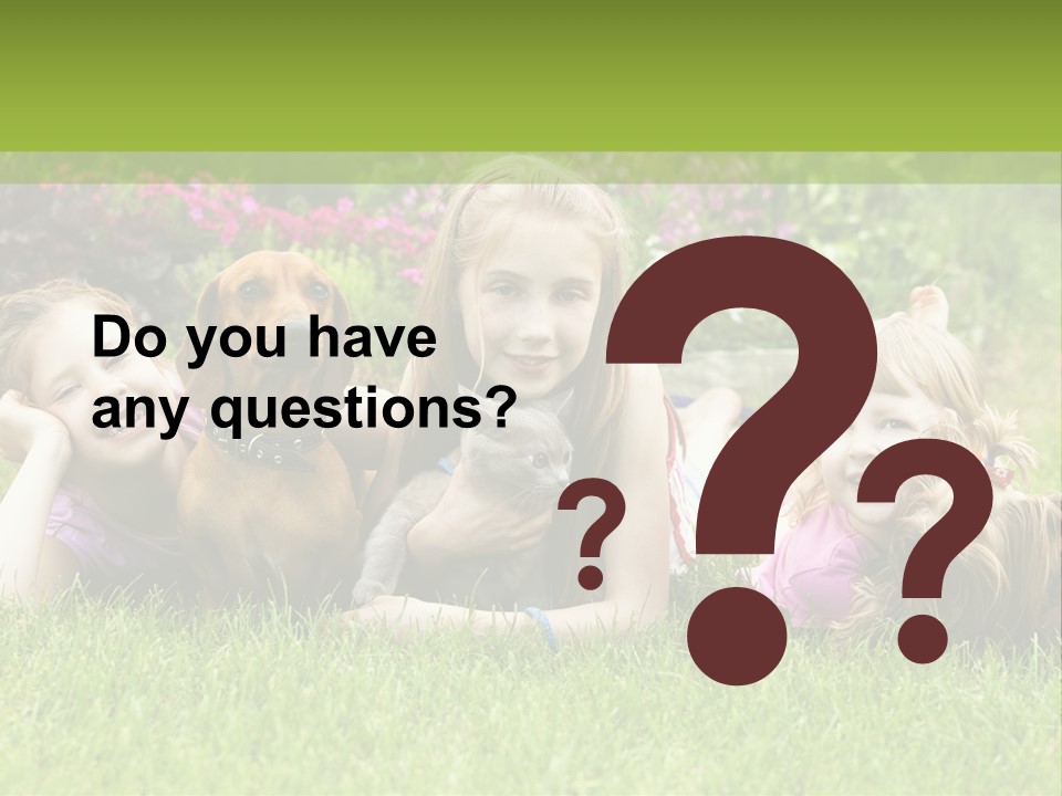 A Group Of Children Laying In The Grass With A Dog PowerPoint Template