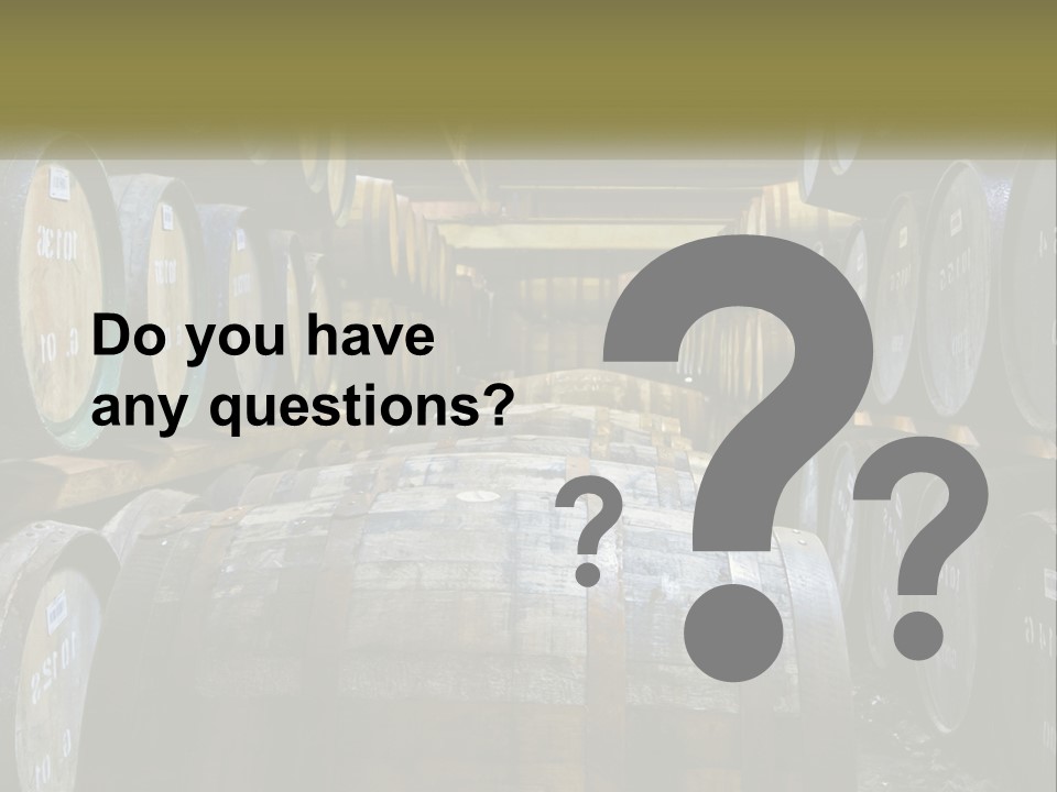 A Large Room Filled With Lots Of Wooden Barrels PowerPoint Template