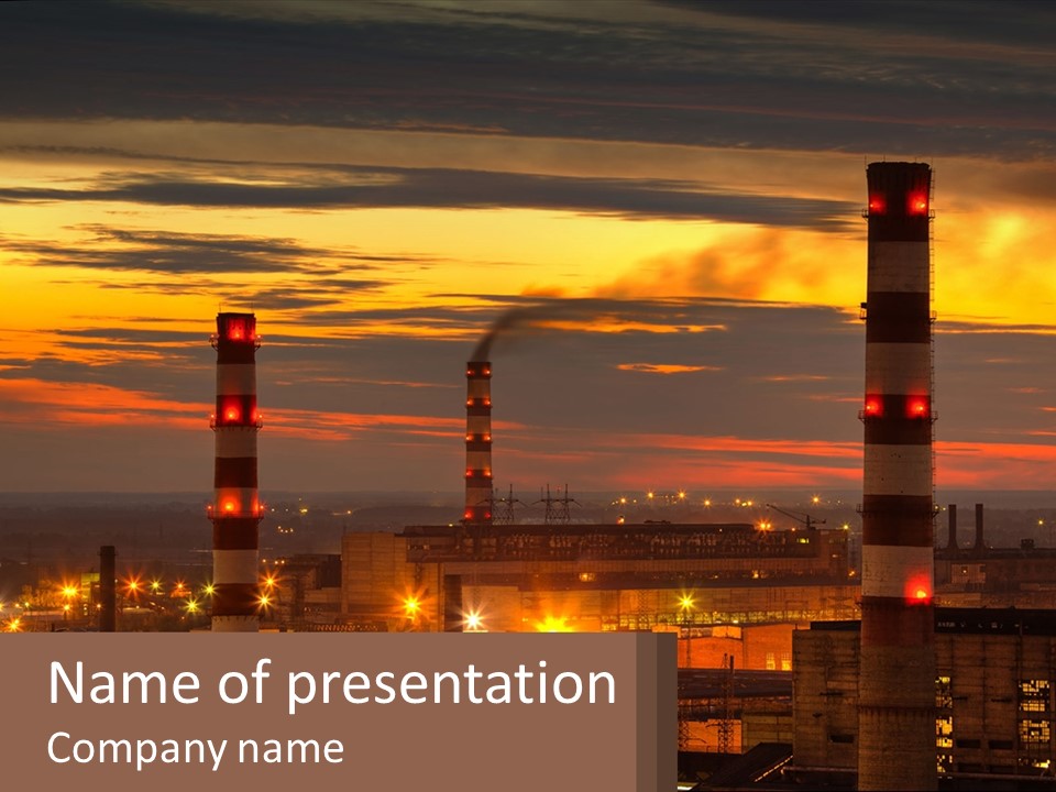 A Power Plant With Red Lights At Sunset PowerPoint Template
