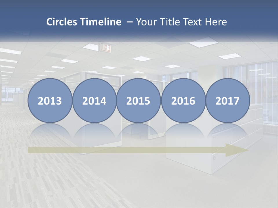 An Empty Office With A Desk And Filing Cabinets PowerPoint Template