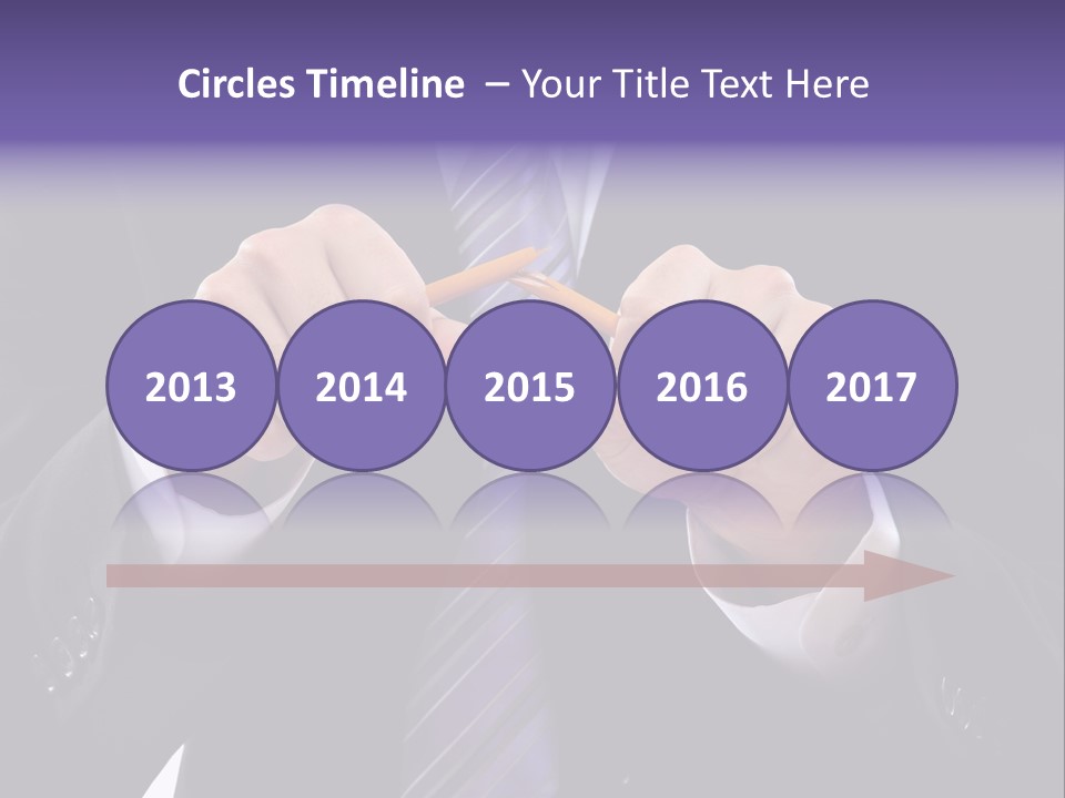 A Man In A Suit Is Holding A Pencil PowerPoint Template