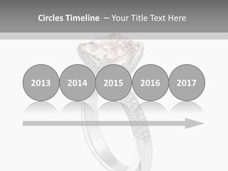 A Ring With A Pink Diamond On It PowerPoint Template