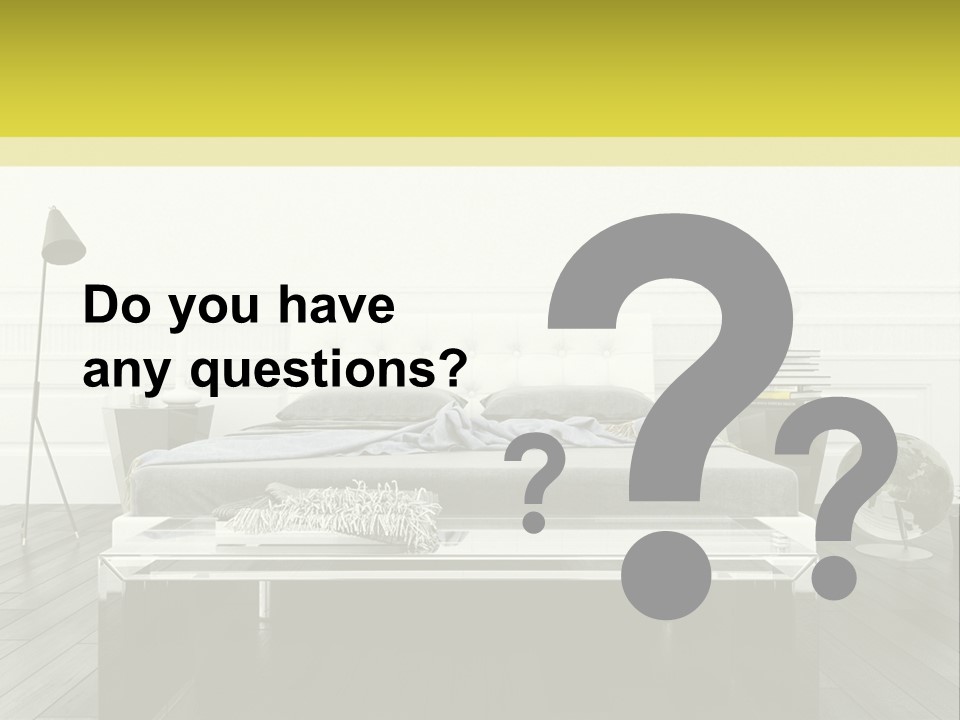 A Bed Sitting In A Bedroom Next To A Table PowerPoint Template