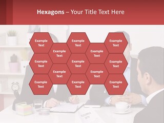 A Group Of People Sitting Around A Table Talking PowerPoint Template