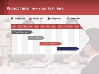 A Group Of People Sitting Around A Table Talking PowerPoint Template