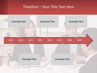 A Group Of People Sitting Around A Table Talking PowerPoint Template