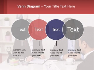 A Group Of People Sitting Around A Table Talking PowerPoint Template