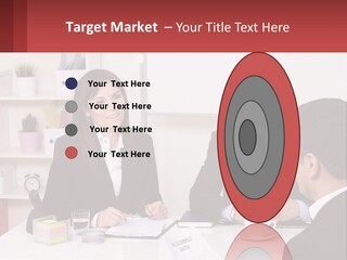 A Group Of People Sitting Around A Table Talking PowerPoint Template