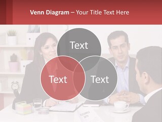 A Group Of People Sitting Around A Table Talking PowerPoint Template