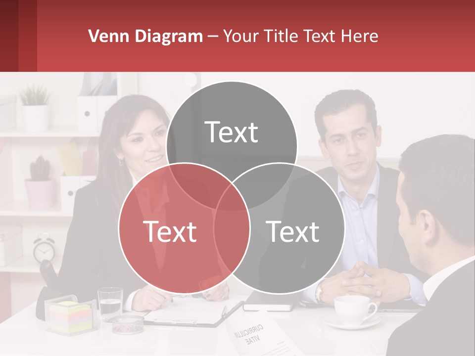 A Group Of People Sitting Around A Table Talking PowerPoint Template