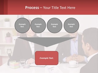 A Group Of People Sitting Around A Table Talking PowerPoint Template