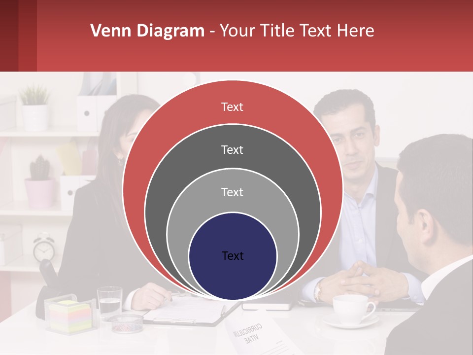 A Group Of People Sitting Around A Table Talking PowerPoint Template