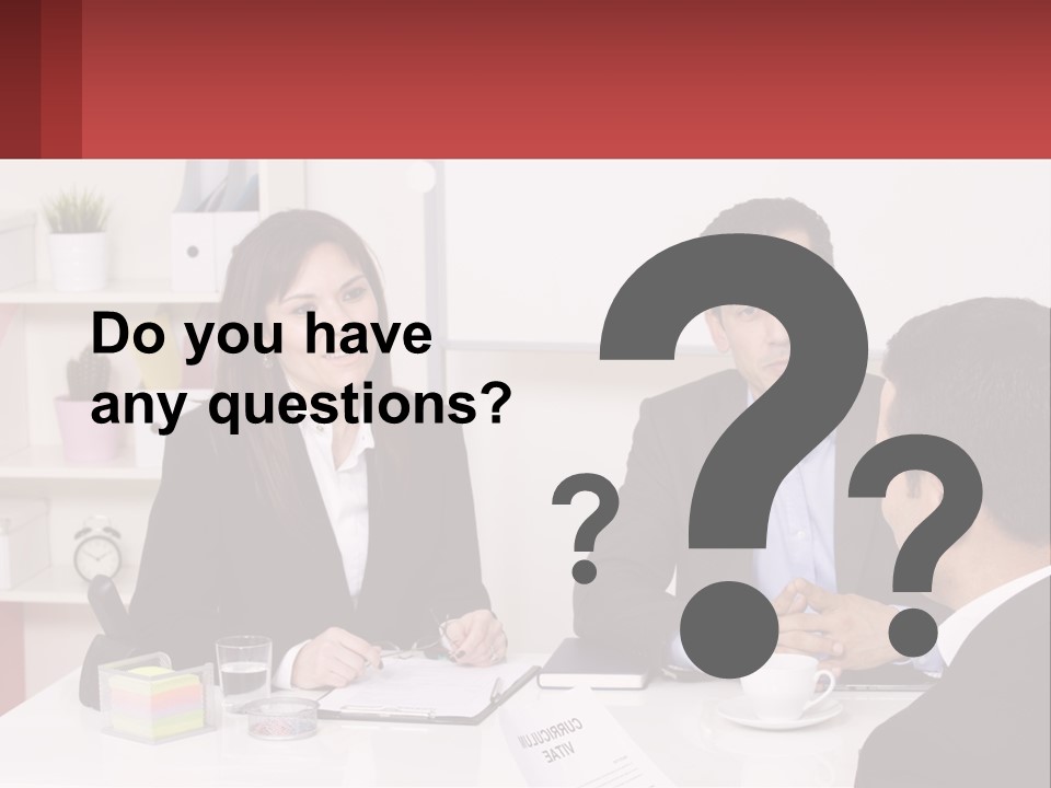 A Group Of People Sitting Around A Table Talking PowerPoint Template