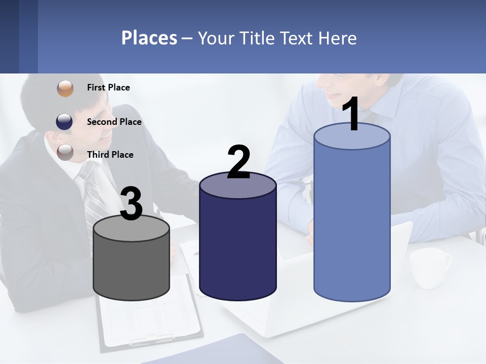 Two Men Sitting At A Table In Front Of A Laptop PowerPoint Template