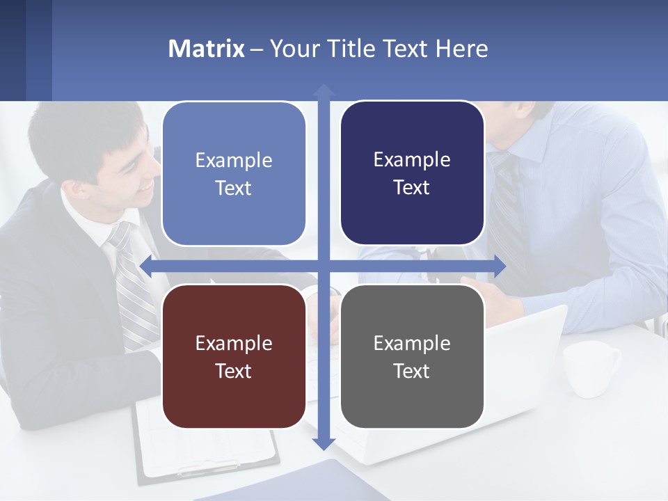 Two Men Sitting At A Table In Front Of A Laptop PowerPoint Template
