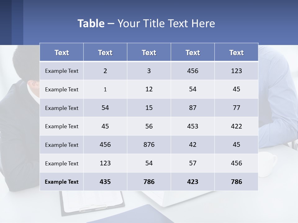 Two Men Sitting At A Table In Front Of A Laptop PowerPoint Template