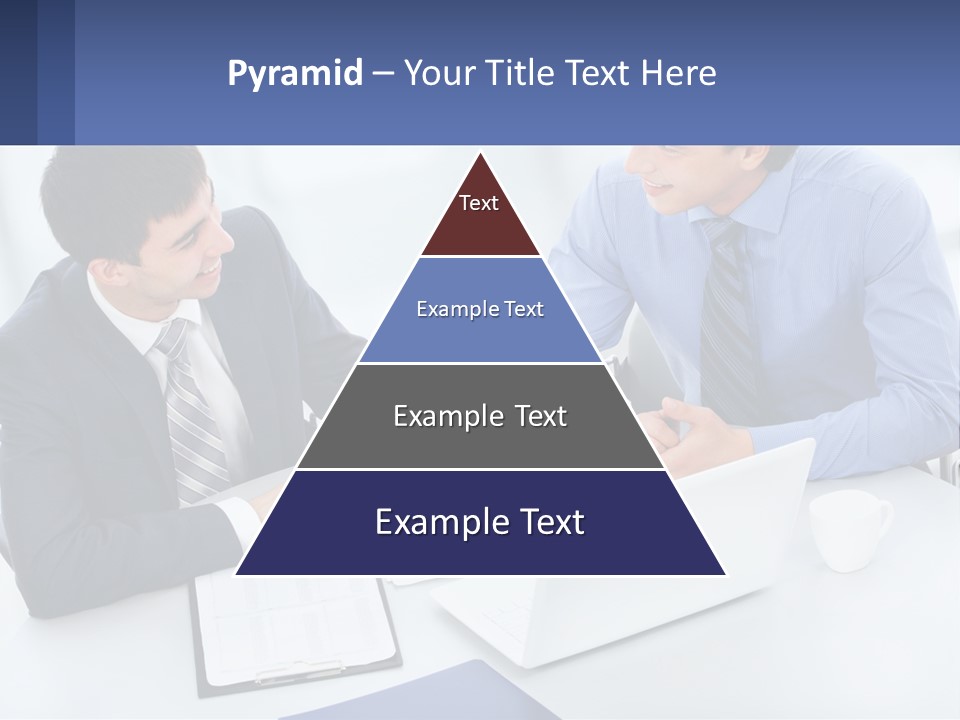 Two Men Sitting At A Table In Front Of A Laptop PowerPoint Template