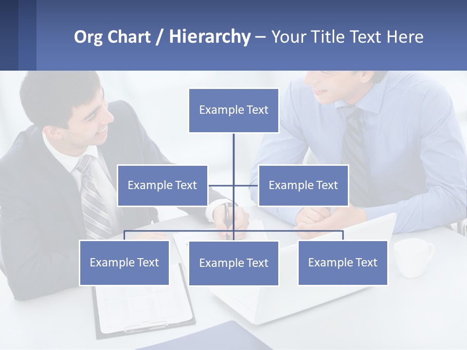 Two Men Sitting At A Table In Front Of A Laptop PowerPoint Template