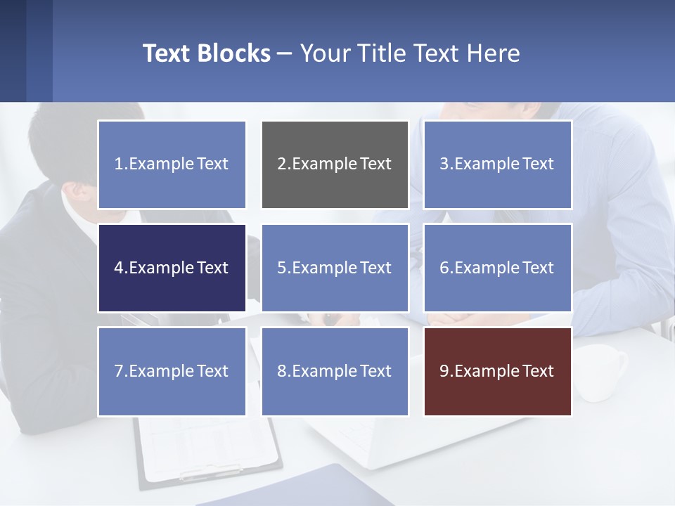 Two Men Sitting At A Table In Front Of A Laptop PowerPoint Template