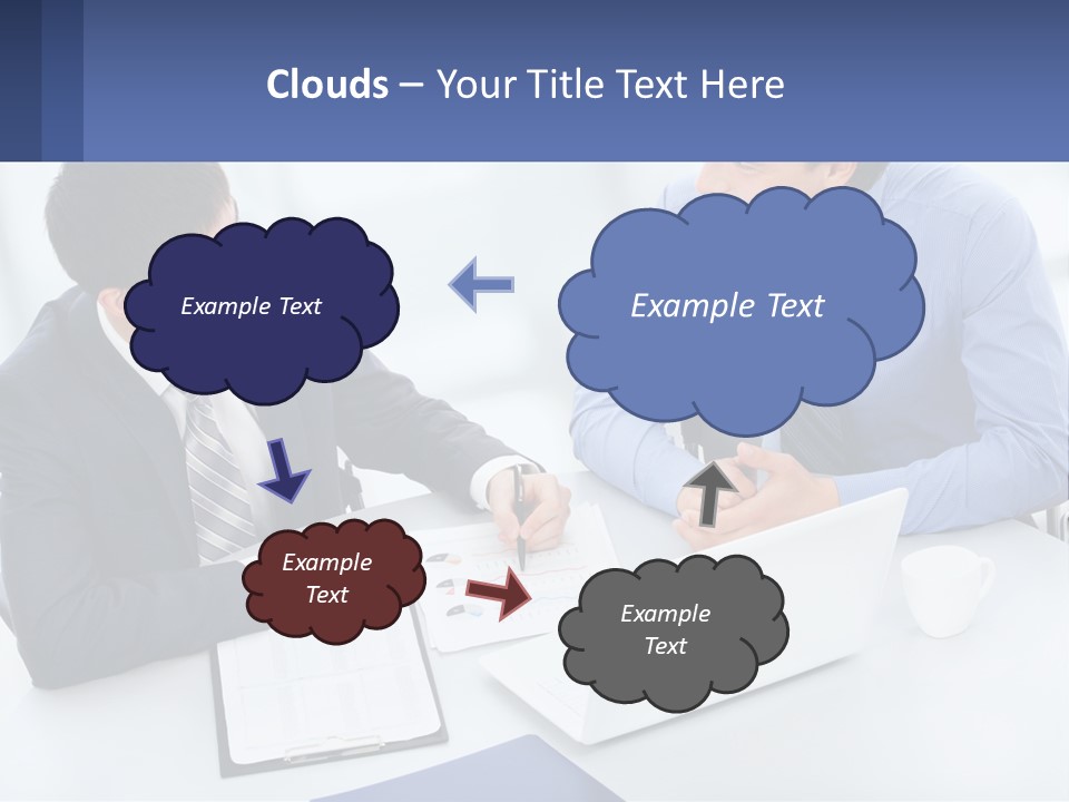Two Men Sitting At A Table In Front Of A Laptop PowerPoint Template