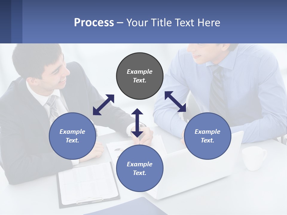 Two Men Sitting At A Table In Front Of A Laptop PowerPoint Template