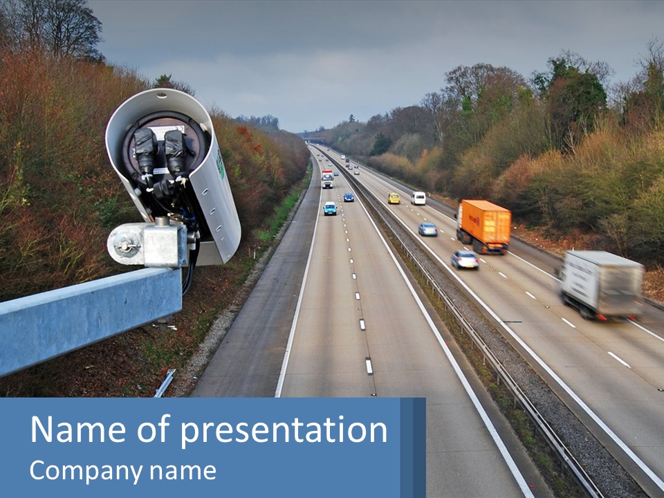 A Highway With A Bunch Of Cars Driving Down It PowerPoint Template