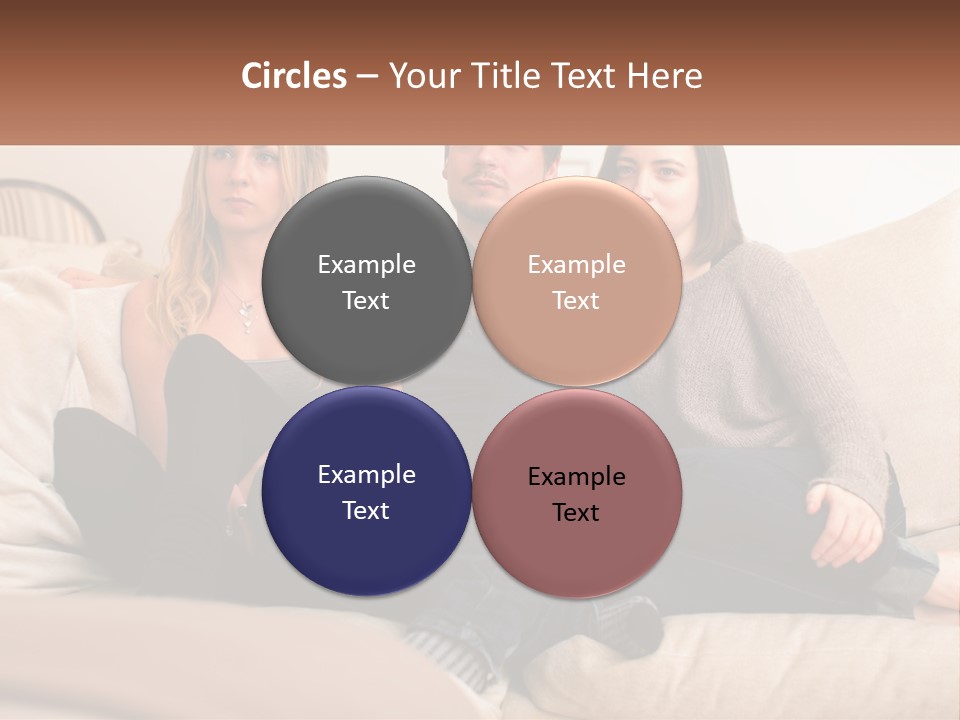 A Man And Woman Sitting On A Couch Pointing At Something PowerPoint Template