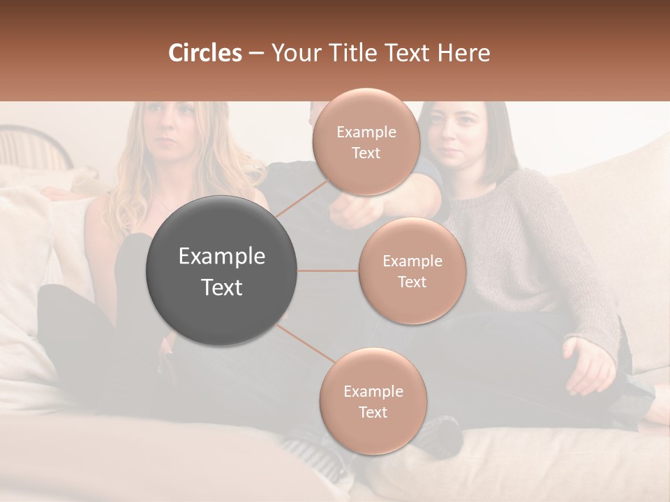 A Man And Woman Sitting On A Couch Pointing At Something PowerPoint Template