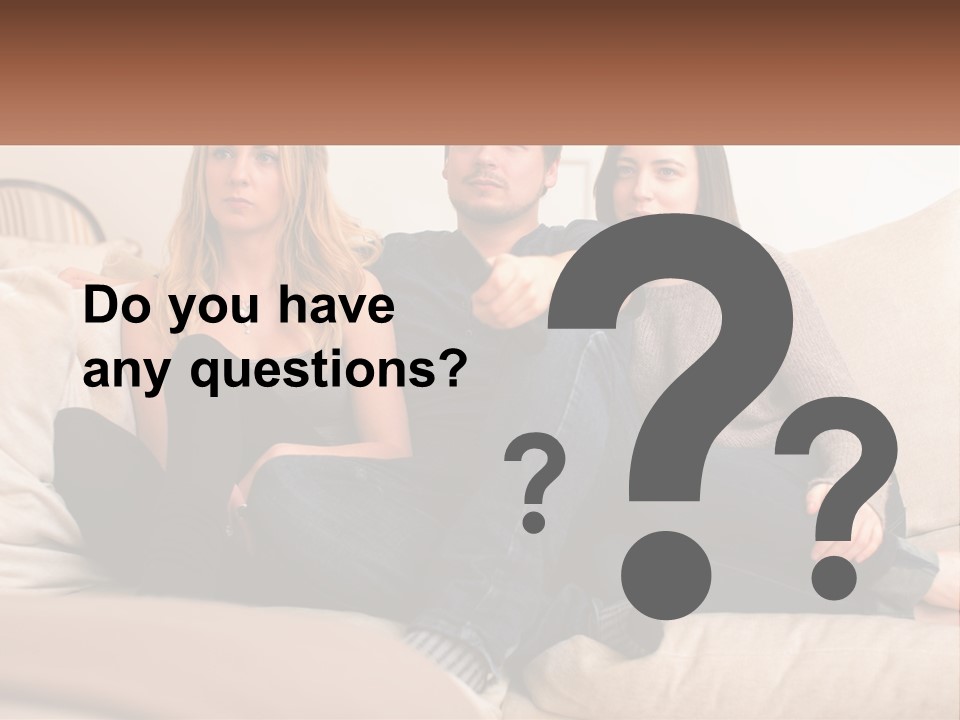 A Man And Woman Sitting On A Couch Pointing At Something PowerPoint Template