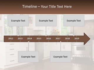 A Kitchen With White Cabinets And A Stainless Steel Stove PowerPoint Template