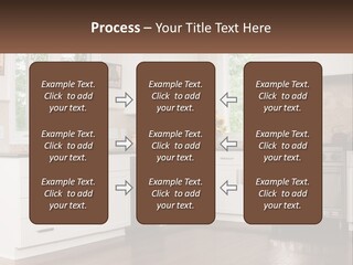 A Kitchen With White Cabinets And A Stainless Steel Stove PowerPoint Template