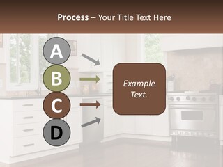 A Kitchen With White Cabinets And A Stainless Steel Stove PowerPoint Template