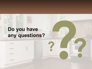 A Kitchen With White Cabinets And A Stainless Steel Stove PowerPoint Template