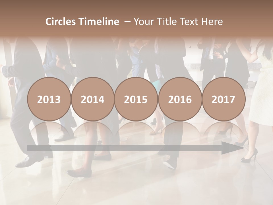 A Group Of People Standing Around Each Other In A Room PowerPoint Template