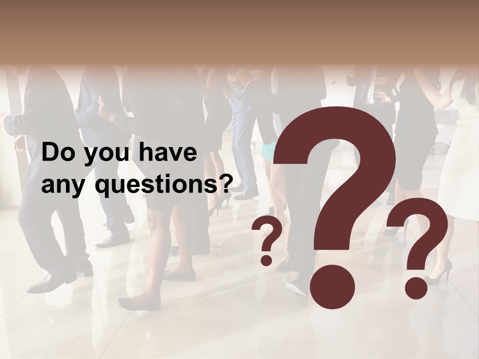 A Group Of People Standing Around Each Other In A Room PowerPoint Template