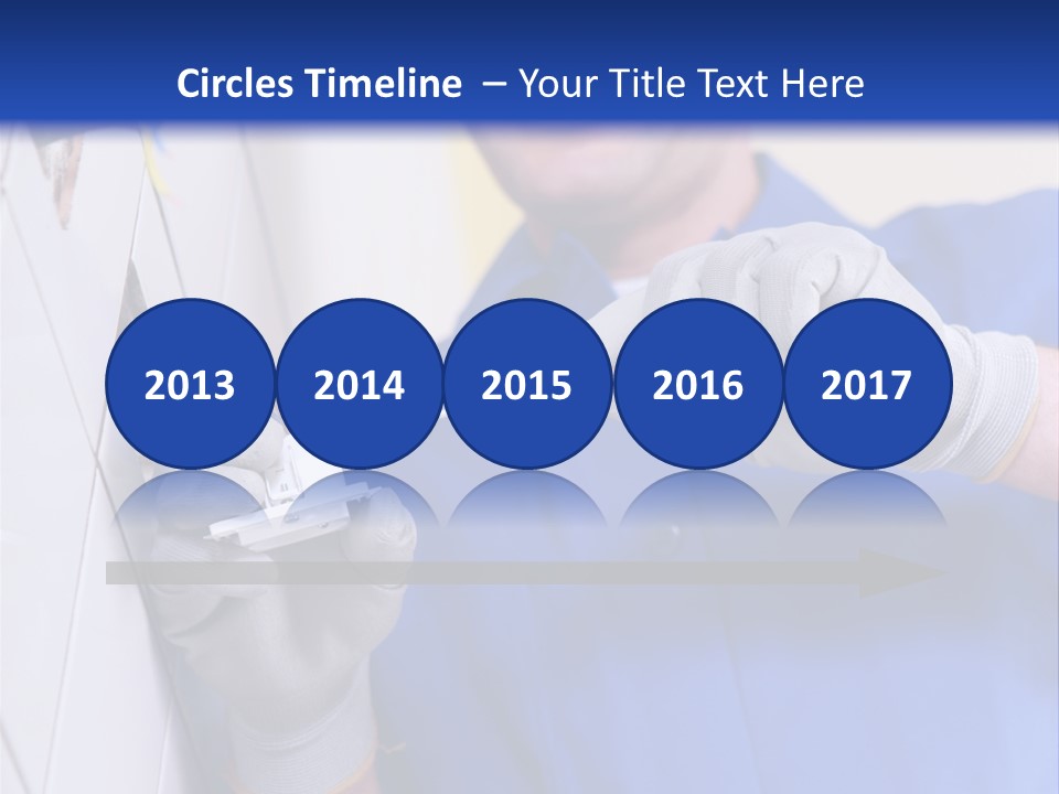 A Man In A Blue Shirt And Hard Hat Working On A Wall PowerPoint Template