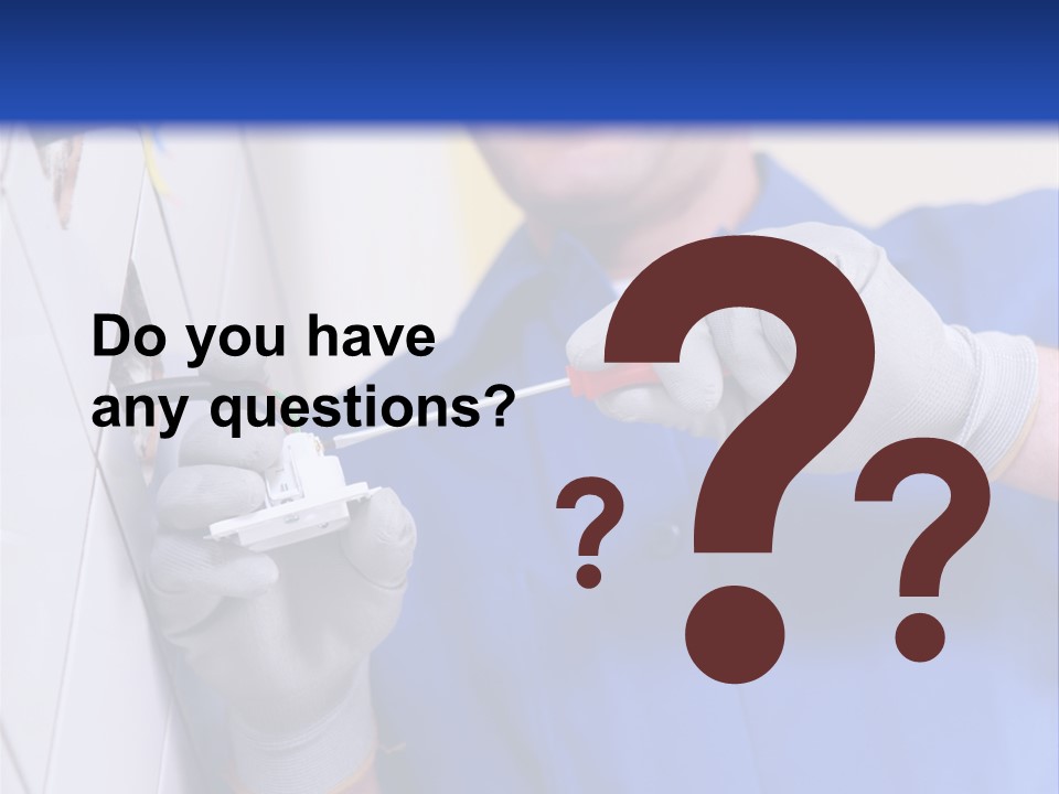 A Man In A Blue Shirt And Hard Hat Working On A Wall PowerPoint Template