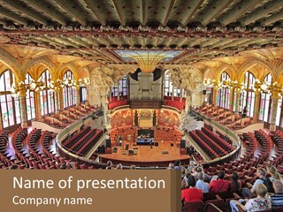 A Large Auditorium Filled With Lots Of People PowerPoint Template
