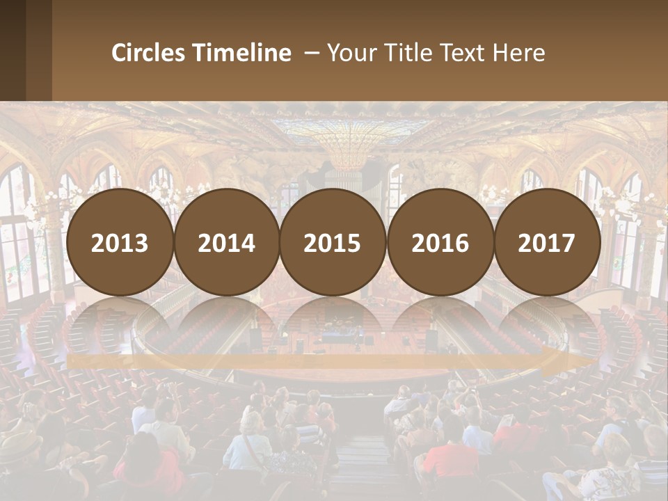 A Large Auditorium Filled With Lots Of People PowerPoint Template