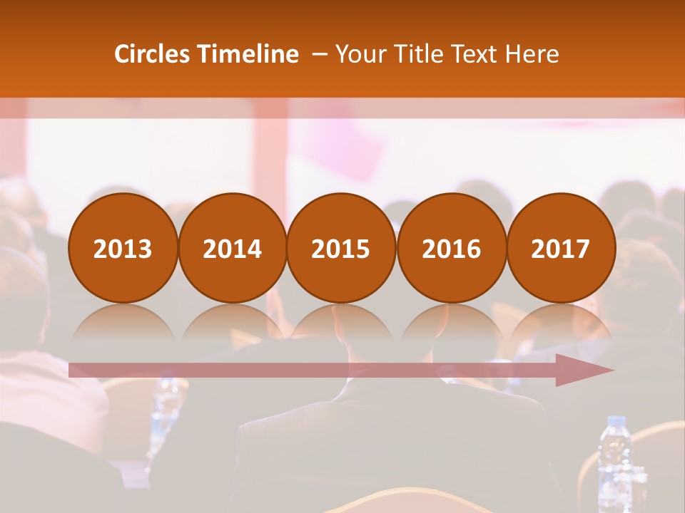 A Man Giving A Presentation To A Group Of People PowerPoint Template