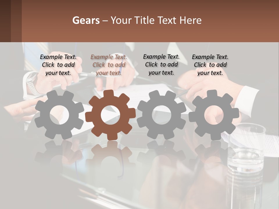 A Group Of Business People Sitting Around A Table PowerPoint Template