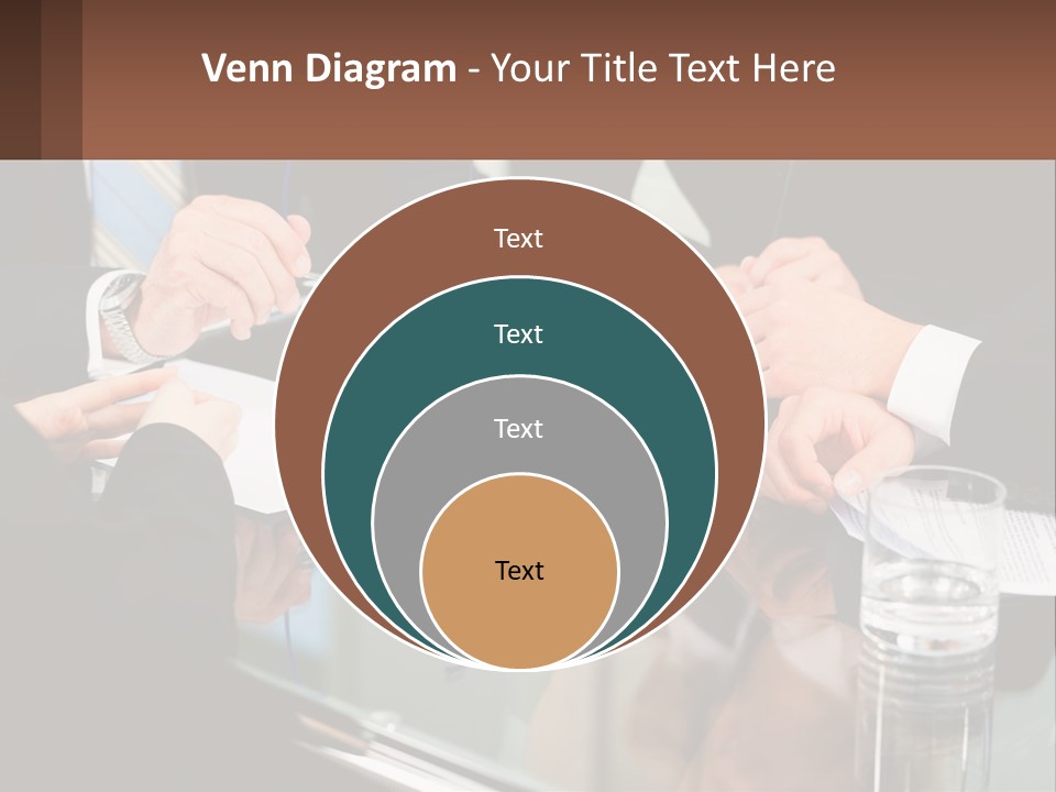 A Group Of Business People Sitting Around A Table PowerPoint Template