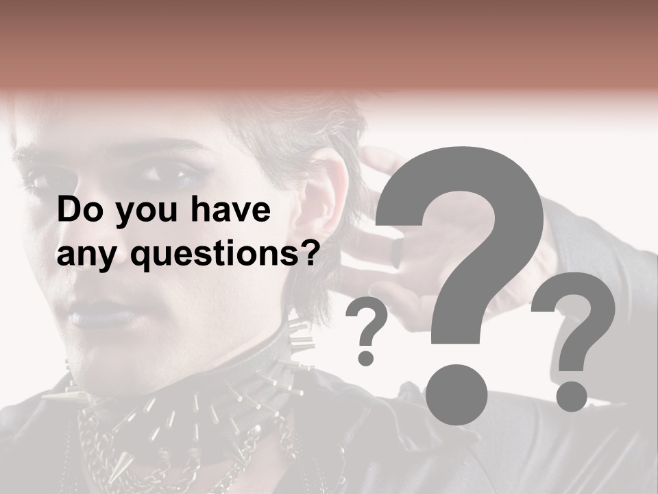 A Man With A Necklace On His Neck Is Holding His Hand Up To His Ear PowerPoint Template